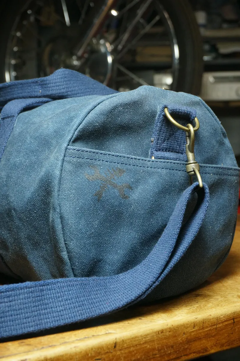 Side view with snap hook and strap.